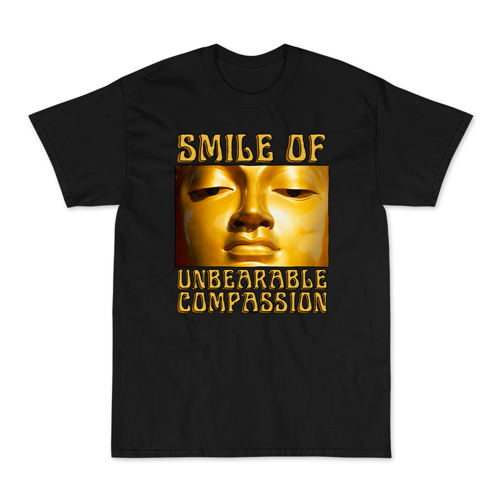 Smile Of Unbearable Compassion Graphic Tee