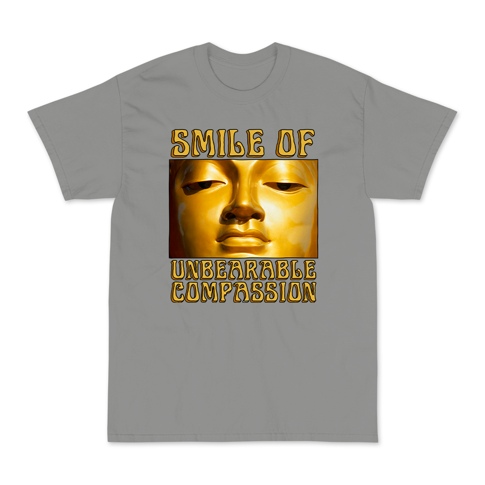 Smile Of Unbearable Compassion Graphic Tee