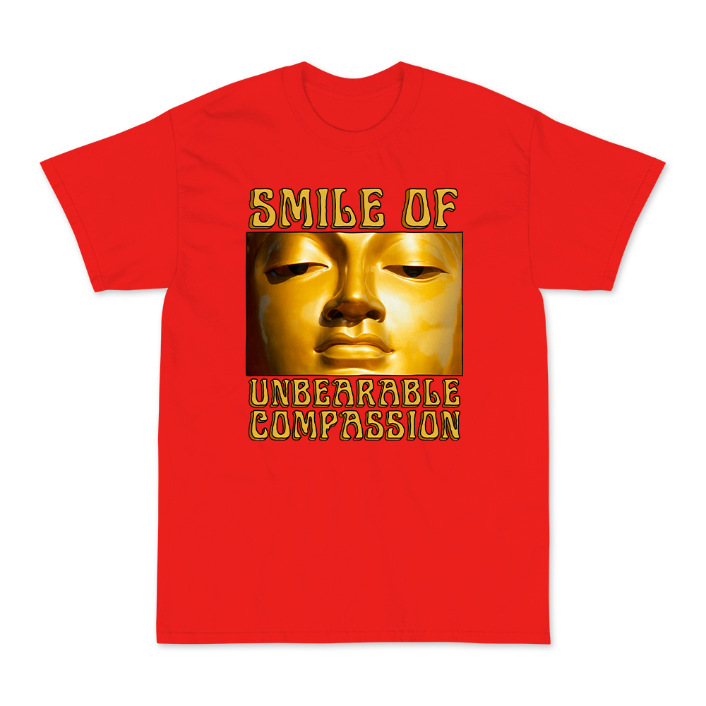 Smile Of Unbearable Compassion Graphic Tee