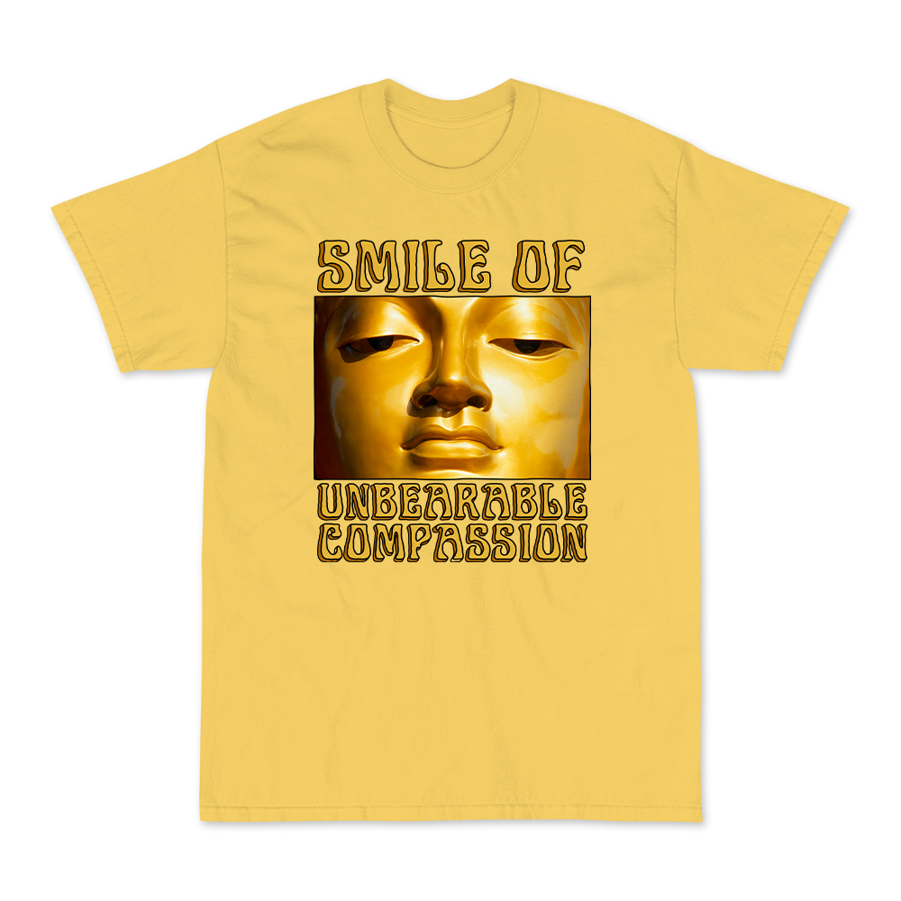 Smile Of Unbearable Compassion Graphic Tee